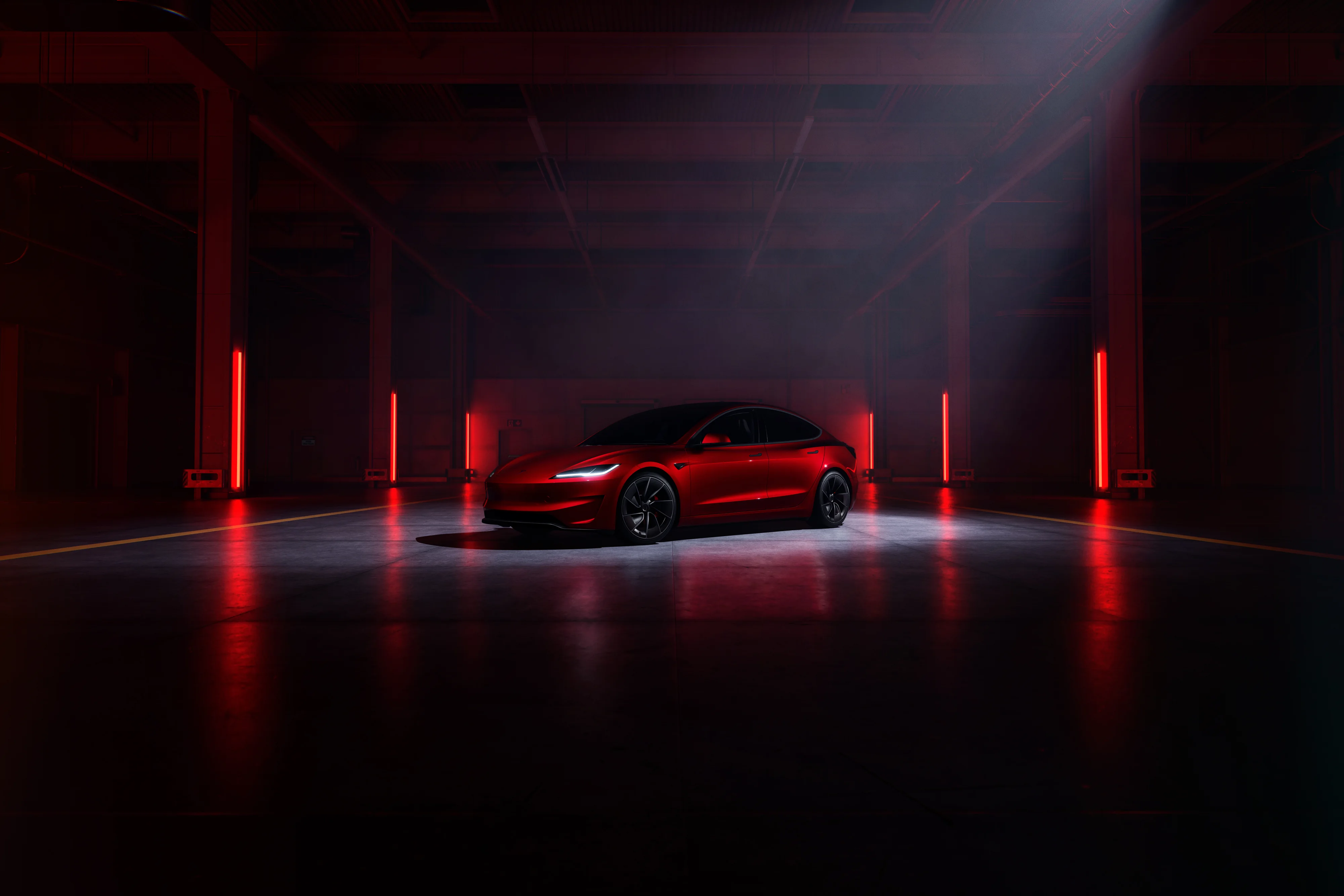 Červená Tesla v Auto Repair Systems Prague